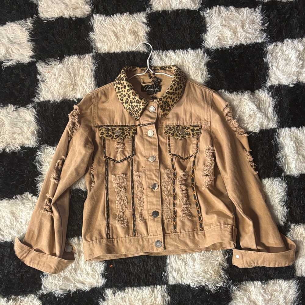 Women’s Custom made Leopard print Jean Jacket .Never worn size women’s large